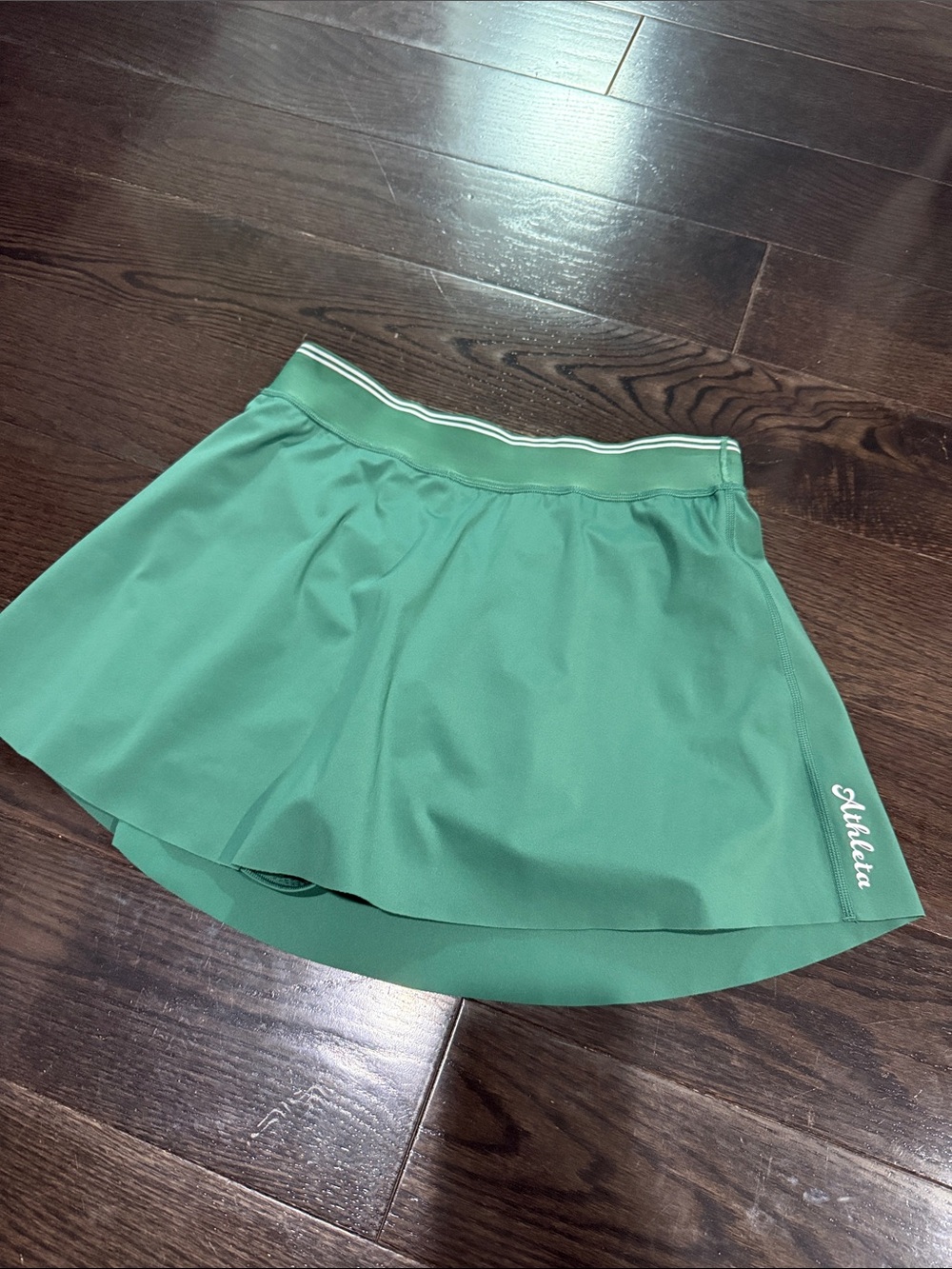 Athleta emerald green skater skort with striped waistband